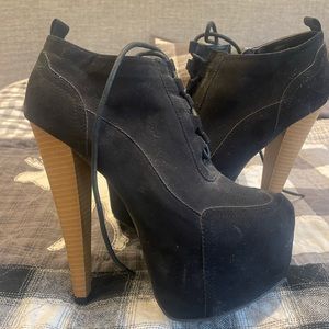 Super high platform zip up booties. Never won outside